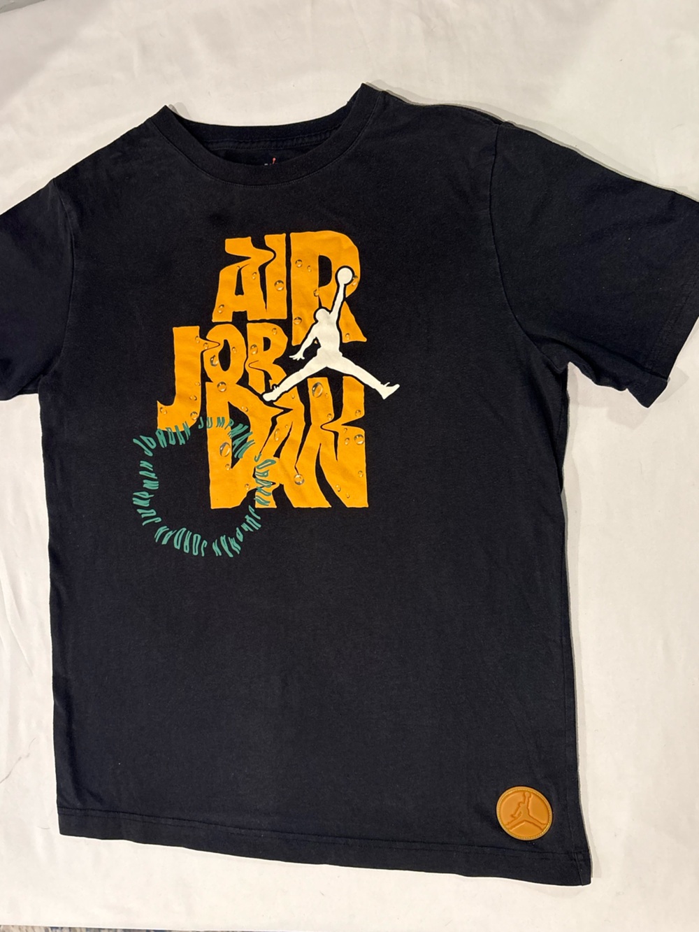 Jordan Black Tee with Orange Air Jordan Graphic and White Jumpman